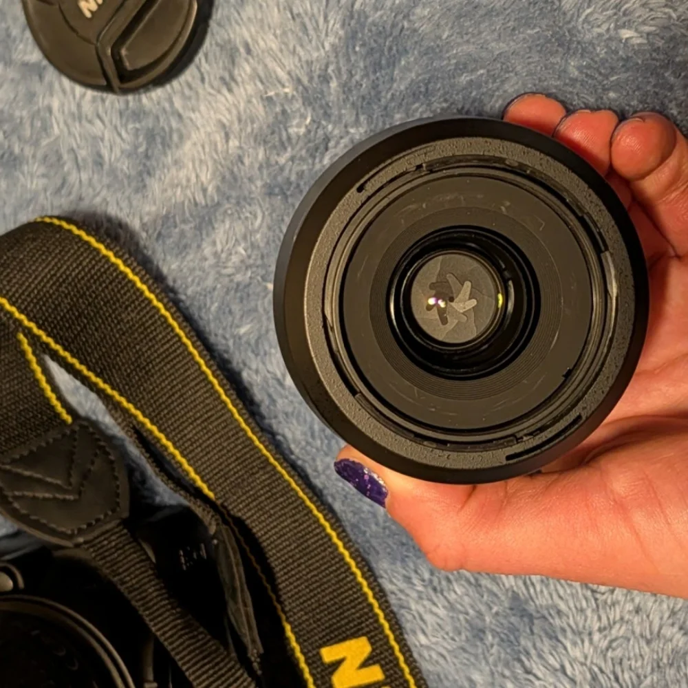 Nikon Black DSLR Camera with 4 Lenses